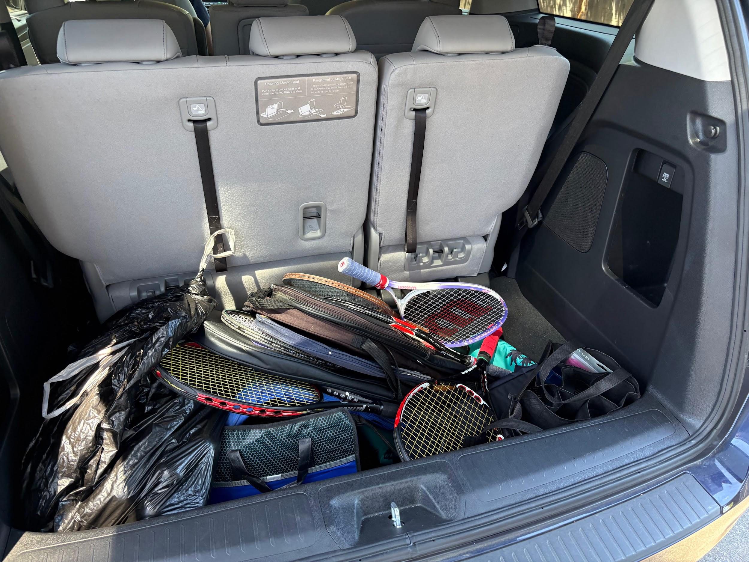 A car trunk full of donated racquets and gear from Almaden Swim and Racquet Club